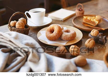 Coffee And Pastry On Wooden Table View Large Photo Image Stock Photo - Coffee And Pastry On Wooden Table. Fotosearch