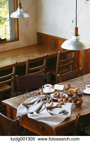 Coffee And Pastry On Wooden Table View Large Photo Image Stock Photography - Coffee And Pastry On Wooden Table. Fotosearch