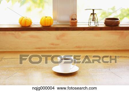 Picture - Coffee Cup On A Table. Fotosearch