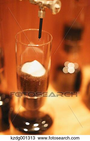 Stock Image - Coffee Dripping Machine. Fotosearch