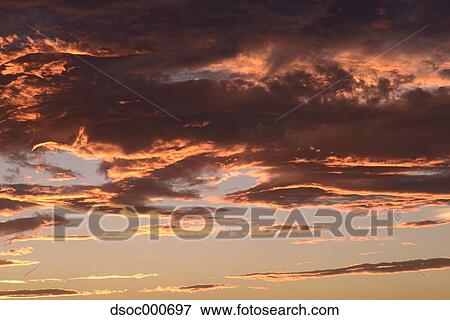 Evening sky with clouds View Large Photo Image Stock Photo - Evening sky with clouds. Fotosearch