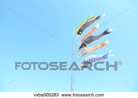 Stock Image - Flying Carps And Blue Sky. Fotosearch
