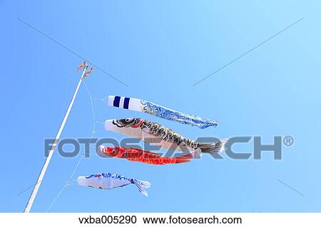 Stock Image - Flying Carps And Blue Sky. Fotosearch