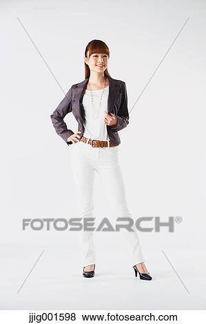 Full length portrait of Japanese young businesswoman against white background View Large Photo Image Stock Photo - Full length portrait of Japanese young businesswoman against white background. Fotosearch