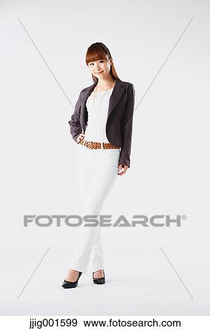 Full length portrait of Japanese young businesswoman against white background View Large Photo Image Stock Photo - Full length portrait of Japanese young businesswoman against white background. Fotosearch