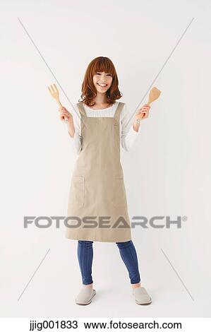 Full length portrait of young Japanese woman against white background View Large Photo Image Stock Image - Full length portrait of young Japanese woman against white background. Fotosearch