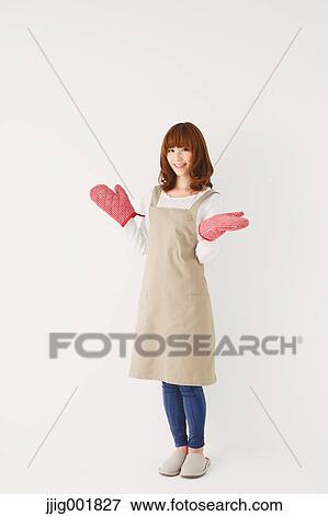 Full length portrait of young Japanese woman against white background View Large Photo Image Stock Photo - Full length portrait of young Japanese woman against white background. Fotosearch