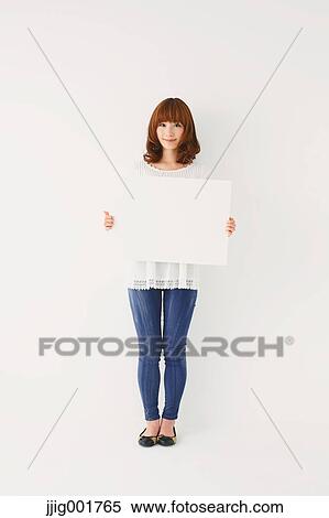 Full length portrait of young Japanese woman against white background View Large Photo Image Stock Photography - Full length portrait of young Japanese woman against white background. Fotosearch