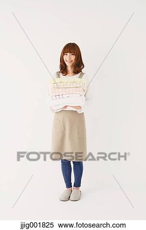Full length portrait of young Japanese woman against white background View Large Photo Image Stock Photography - Full length portrait of young Japanese woman against white background. Fotosearch