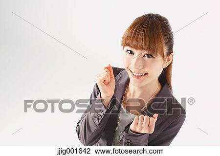 Half length portrait of Japanese young businesswoman against white background View Large Photo Image Stock Image - Half length portrait of Japanese young businesswoman against white background. Fotosearch