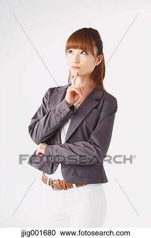 Half length portrait of Japanese young businesswoman against white background View Large Photo Image Stock Image - Half length portrait of Japanese young businesswoman against white background. Fotosearch