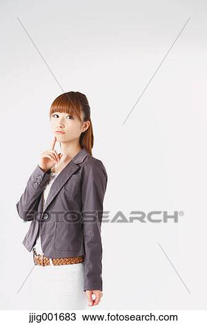 Half length portrait of Japanese young businesswoman against white background View Large Photo Image Stock Image - Half length portrait of Japanese young businesswoman against white background. Fotosearch