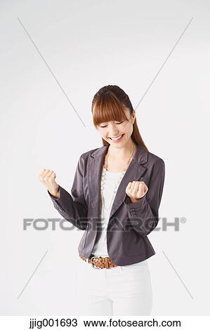 Half length portrait of Japanese young businesswoman against white background View Large Photo Image Stock Image - Half length portrait of Japanese young businesswoman against white background. Fotosearch