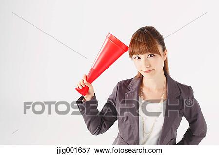 Half length portrait of Japanese young businesswoman against white background View Large Photo Image Stock Photo - Half length portrait of Japanese young businesswoman against white background. Fotosearch
