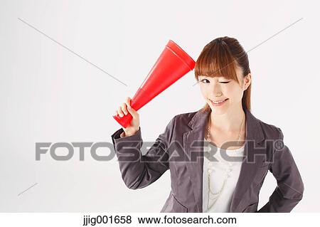 Half length portrait of Japanese young businesswoman against white background View Large Photo Image Stock Photo - Half length portrait of Japanese young businesswoman against white background. Fotosearch