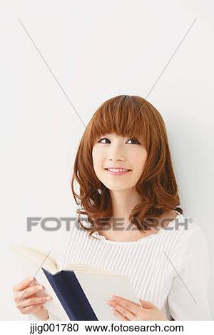 Half length portrait of young Japanese woman against white background View Large Photo Image Stock Image - Half length portrait of young Japanese woman against white background. Fotosearch
