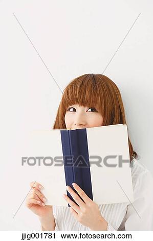 Half length portrait of young Japanese woman against white background View Large Photo Image Stock Image - Half length portrait of young Japanese woman against white background. Fotosearch