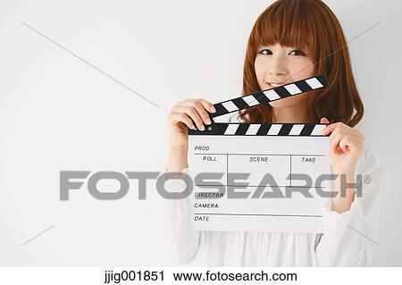Half length portrait of young Japanese woman against white background View Large Photo Image Stock Image - Half length portrait of young Japanese woman against white background. Fotosearch