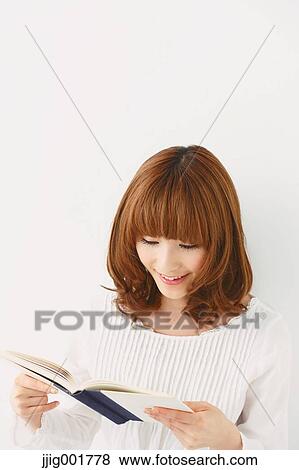 Half length portrait of young Japanese woman against white background View Large Photo Image Stock Photo - Half length portrait of young Japanese woman against white background. Fotosearch