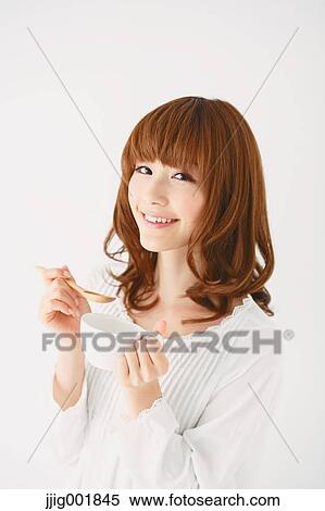 Half length portrait of young Japanese woman against white background View Large Photo Image Stock Photography - Half length portrait of young Japanese woman against white background. Fotosearch