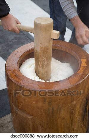 Stock Photo - Japanese style Mochi pounding. Fotosearch