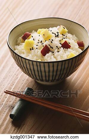 Japanese style sweet potato rice View Large Photo Image Stock Photo - Japanese style sweet potato rice. Fotosearch