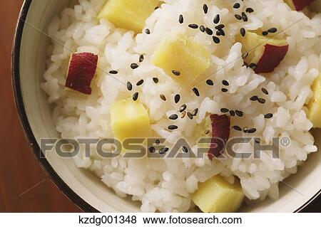 Japanese style sweet potato rice View Large Photo Image Stock Photo - Japanese style sweet potato rice. Fotosearch