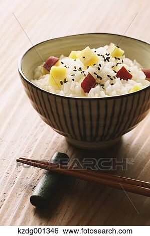 Stock Photograph - Japanese style sweet potato rice. Fotosearch