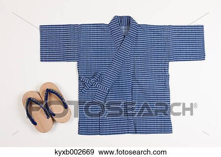 Stock Photo - Japanese style Yukata and wooden clogs. Fotosearch