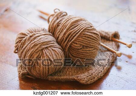Stock Photo - Knitting Set On Wooden Table. Fotosearch