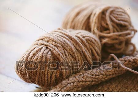 Stock Photograph - Knitting Set On Wooden Table. Fotosearch