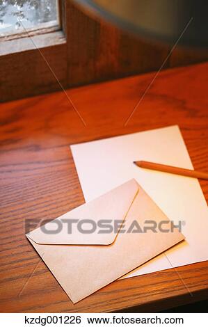 Letters And Pencil On Wooden Table View Large Photo Image Stock Photograph - Letters And Pencil On Wooden Table. Fotosearch