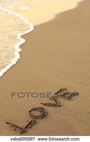 Stock Photo - Love Writing On The Beach. Fotosearch