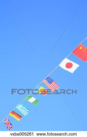 Stock Image - National Flags And Blue Sky. Fotosearch