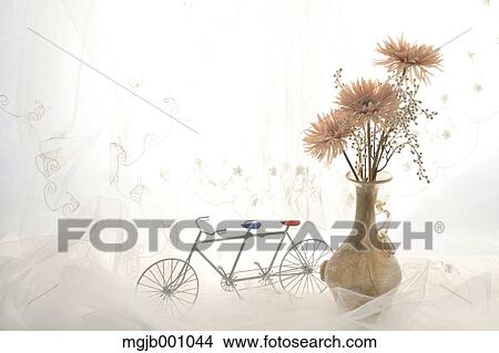 Potted flowers and vintage bike View Large Photo Image Picture - Potted flowers and vintage bike. Fotosearch