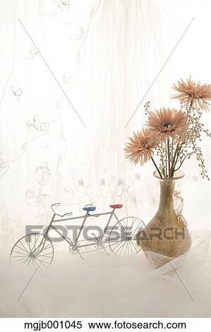 Potted flowers and vintage bike View Large Photo Image Stock Photography - Potted flowers and vintage bike. Fotosearch