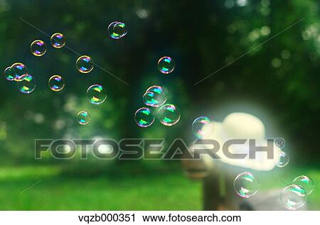 Soap Bubbles In A Park View Large Photo Image Stock Image - Soap Bubbles In A Park. Fotosearch