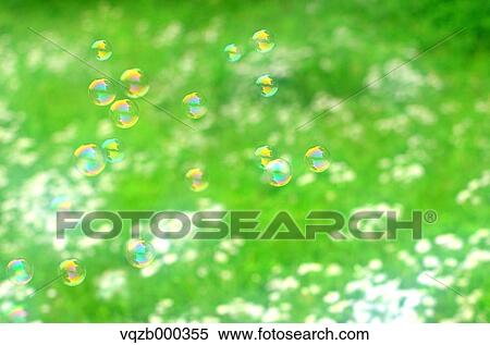 Soap Bubbles In A Park View Large Photo Image Stock Photography - Soap Bubbles In A Park. Fotosearch