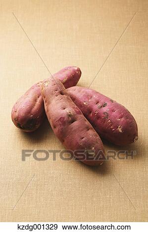 Sweet potatoes View Large Photo Image Stock Photo - Sweet potatoes. Fotosearch