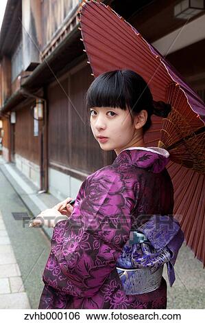 Stock Photograph - Young Japanese Girl In A Kimono. Fotosearch