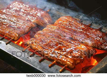 Stock Image - Grilled eel. Fotosearch