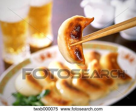 Gyoza dumplings View Large Photo Image Stock Photography - Gyoza dumplings. Fotosearch