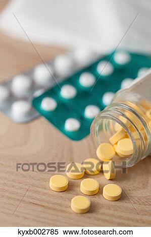 Pills on wooden table View Large Photo Image Stock Photography - Pills on wooden table. Fotosearch