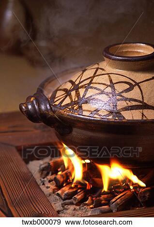Stock Photo - Pot on the flame. Fotosearch