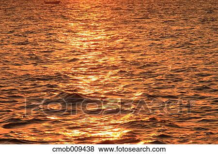 Sea at sunset View Large Photo Image Stock Photo - Sea at sunset. Fotosearch