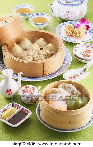 Dim Sum dumplings View Large Photo Image Stock Photograph - Dim Sum dumplings. Fotosearch