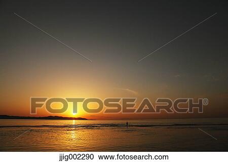 "Fisherman at sea at sunset, Chiba Prefecture, Japan" View Large Photo Image Stock Image - "Fisherman at sea at sunset, Chiba Prefecture, Japan". Fotosearch