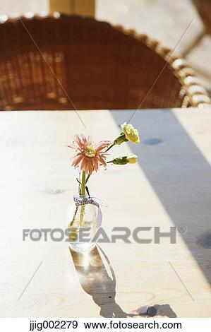 Flowers on a table View Large Photo Image Stock Photo - Flowers on a table. Fotosearch
