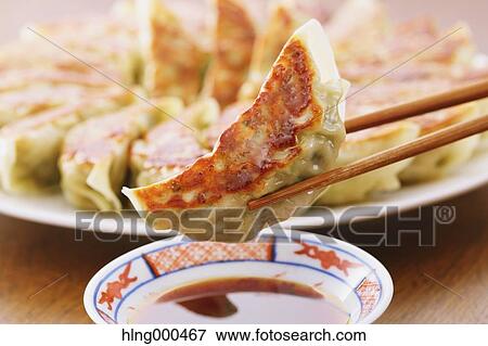 Gyoza dumplings View Large Photo Image Stock Photo - Gyoza dumplings. Fotosearch