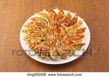 Gyoza dumplings View Large Photo Image Stock Photograph - Gyoza dumplings. Fotosearch